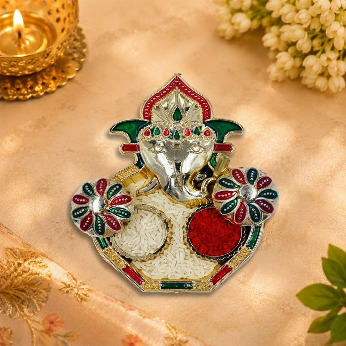 Designer Stone Rakhi for Brother & Bhabhi with Chocolate and Ganesha Showpiece Gift Designer Stone Rakhi for Brother & Bhabhi with Chocolate and Ganesha Showpiece Gift