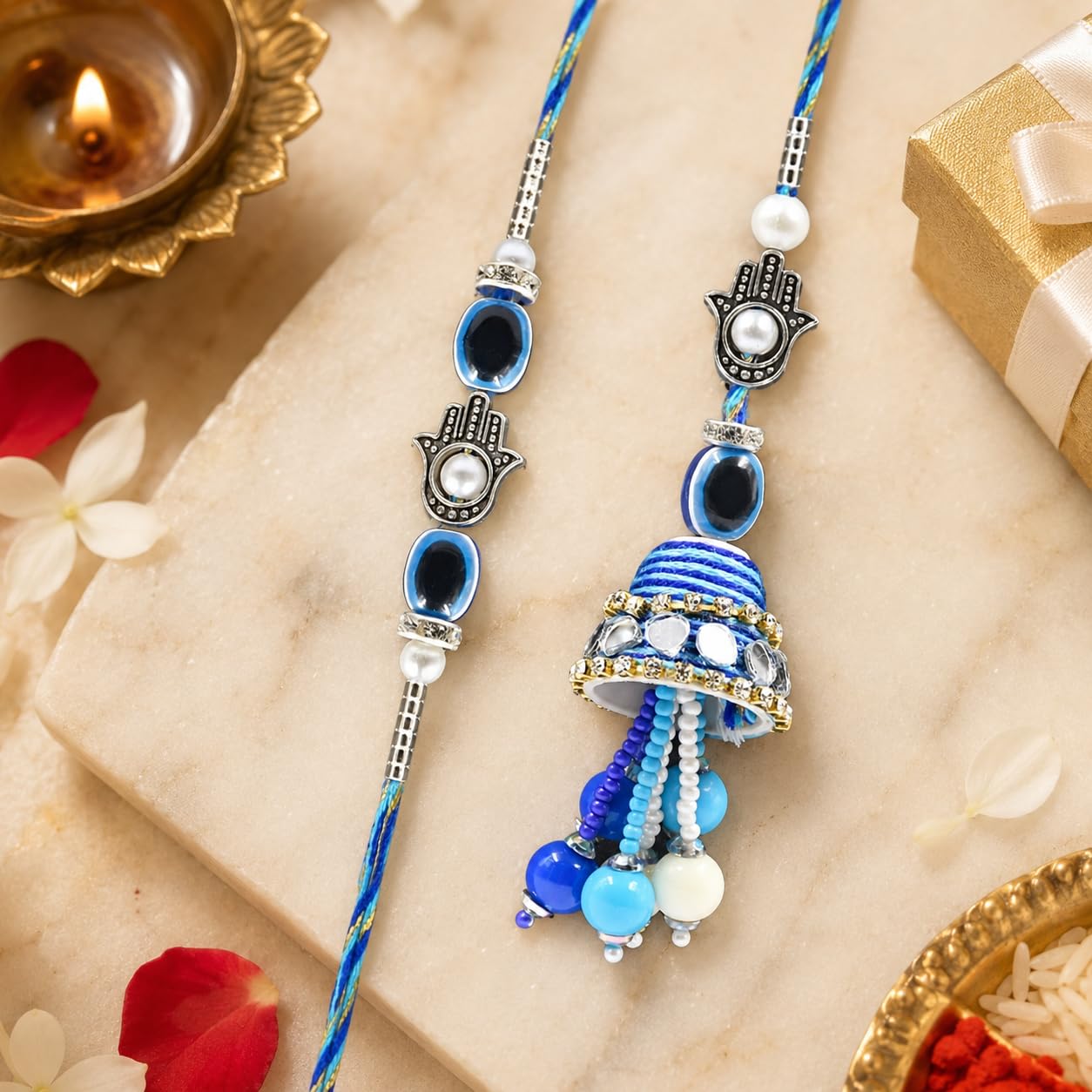 Evil Eye Family Rakhi Set of 3 with Chocolate & Roli Chawal Plate Evil Eye Family Rakhi Set of 3 with Chocolate & Roli Chawal Plate