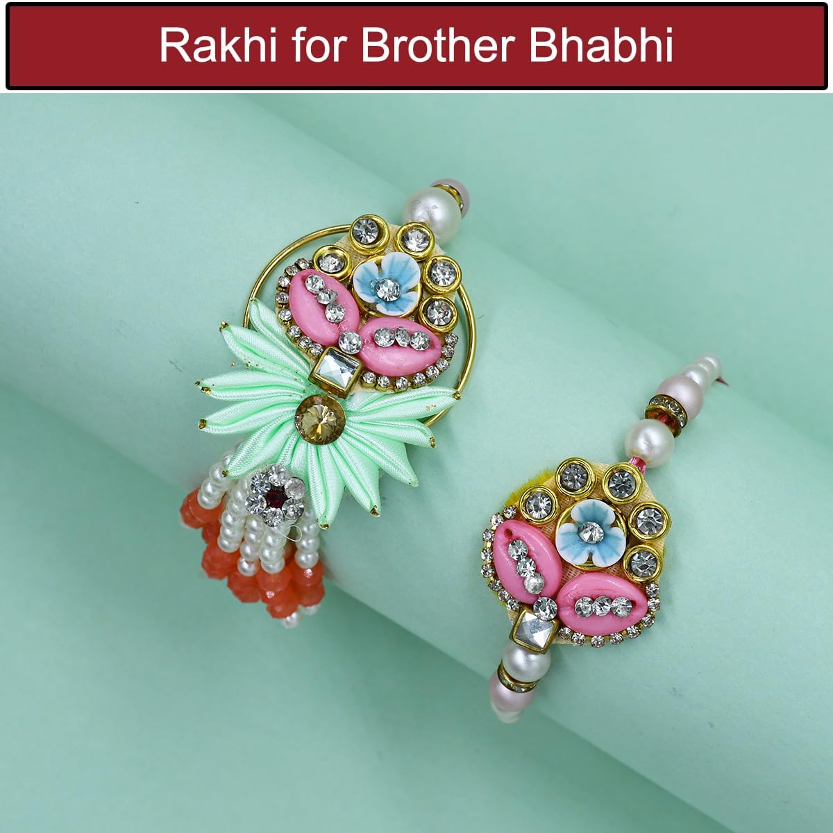Designer Stone Rakhi for Brother & Bhabhi with Chocolate and Ganesha Showpiece Gift Designer Stone Rakhi for Brother & Bhabhi with Chocolate and Ganesha Showpiece Gift