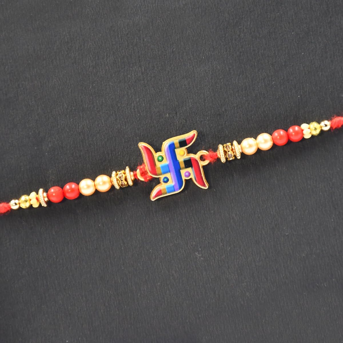 Swastik Rakhi Set of 4 with Chocolate Gift for Brother Swastik Rakhi Set of 4 with Chocolate Gift for Brother