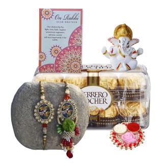 Designer Stone Rakhi for Brother & Bhabhi with Chocolate and Ganesha Showpiece Gift